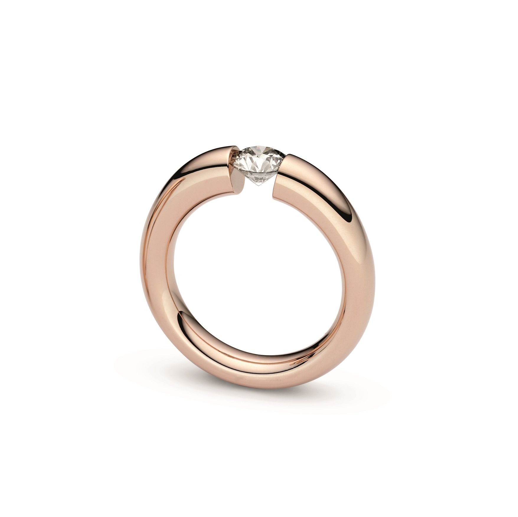 Verlobungsringe Rosewood 19 Niessing Spannring Verlauf in Rosewood Gold mit Brillant. Gefertigt in Deutschland, präsentiert dieser Ring die unverwechselbare Designsprache von Niessing. Erhältlich bei EVA Trauringwelten in Hagen.